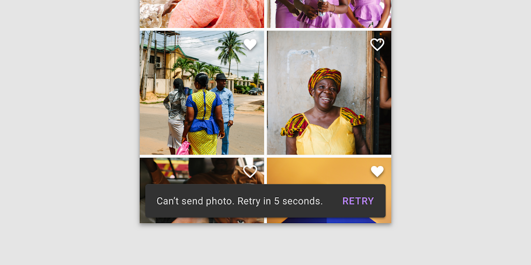 Photo grid: each photo has heart toggle button, 2 selected. Snackbar has
upload error message and 'retry' text
button.